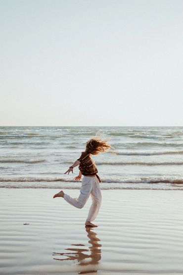 girl dancing at Sauble Beach