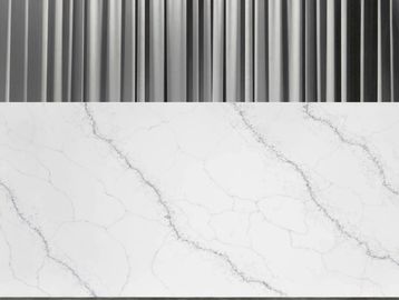 Modern white marble wall with gray veining and vertical metallic slats.