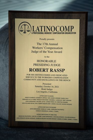 Award plaque honoring Judge Robert Rassp as Workers' Compensation Judge of the Year 2021.