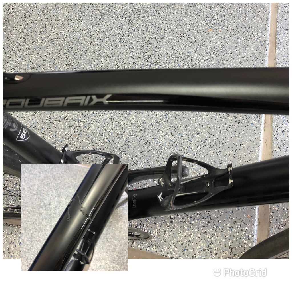 Specialed Roubaix top tube damage with matte black paint match. 