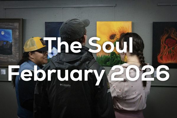 Three people view artwork at an exhibit titled The Soul, February 2026.