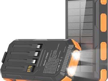 Solar power bank with flashlight and USB charging ports.