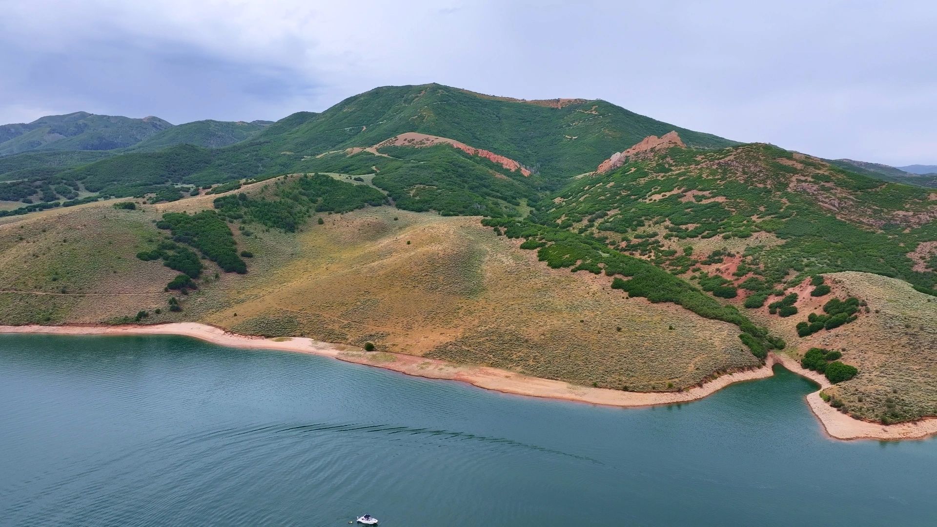 aerial view of mountain with water