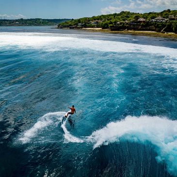 drone filming person paddler boarding