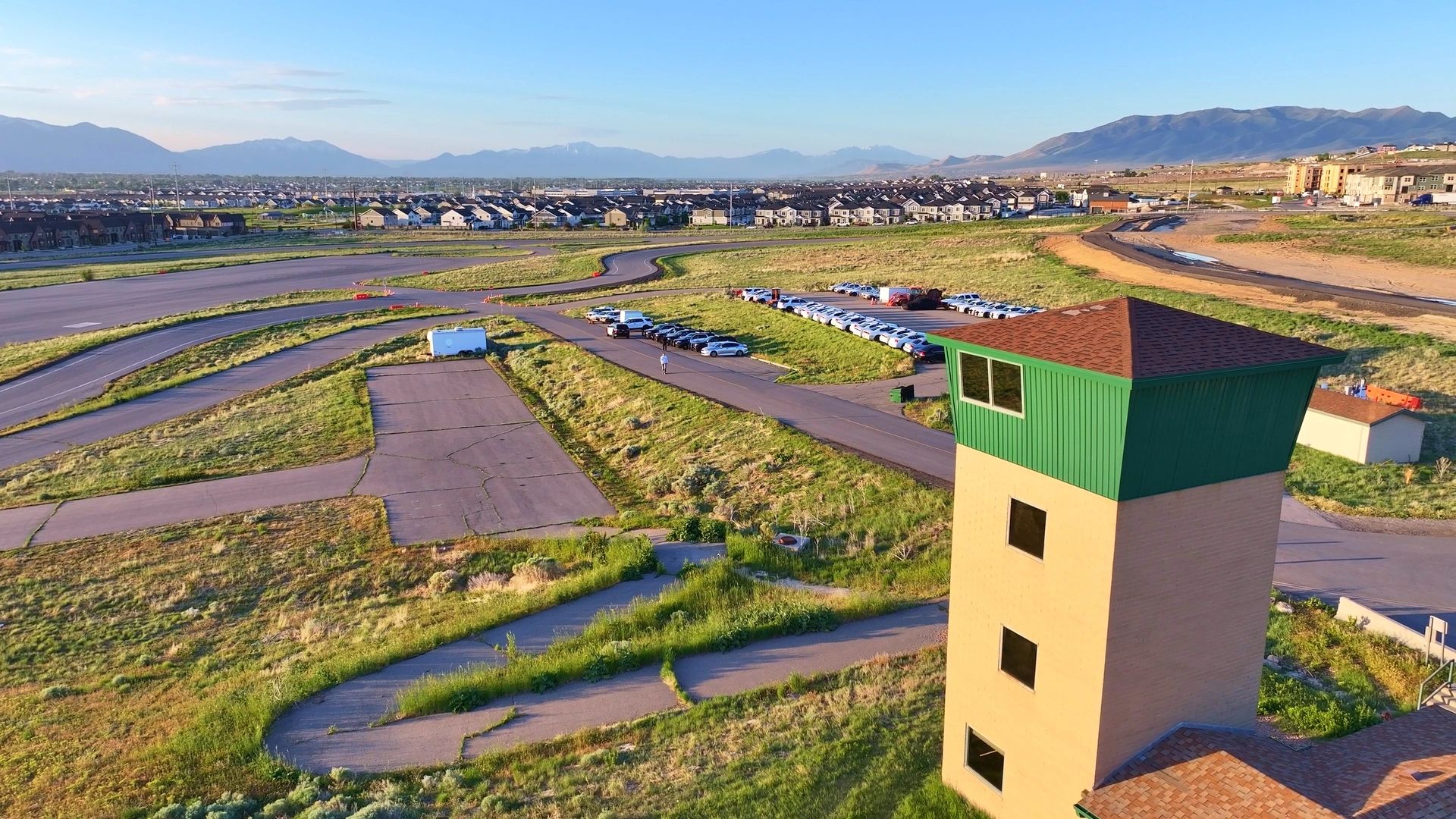 drone photo of a tower with a car driving course 