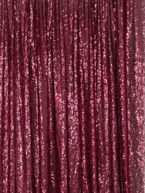 Sparkling deep burgundy sequin curtain with vertical folds.  Photo booth backdrop rental