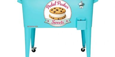 A blue cooler with a cookie logo and the text 'Pedal Pusher Sweets'.