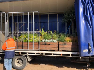 Modular garden beds being transported from Athol Park to Wayville.