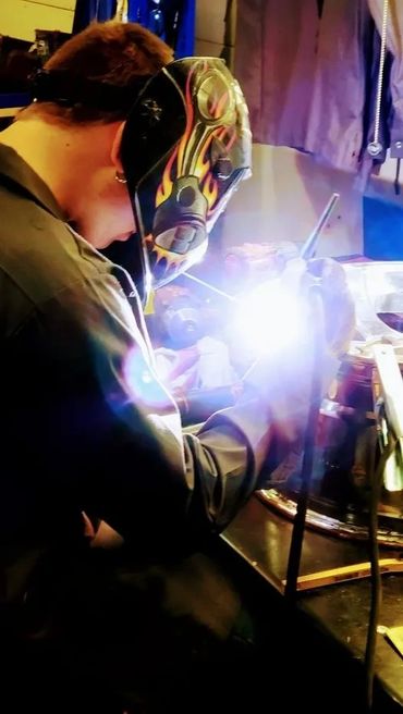 I just love pictures of the boys welding...there is something mesmerizing about it!