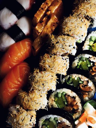 Close-up of assorted sushi rolls and nigiri.