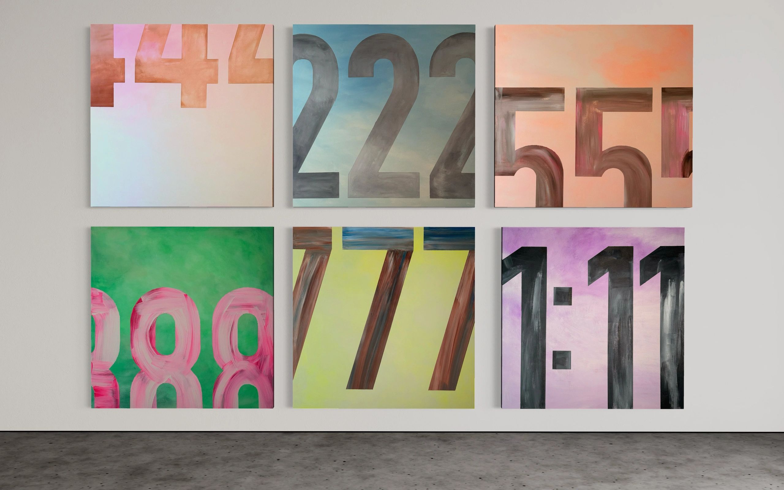 Six colorful paintings with large numbers on a gallery wall.