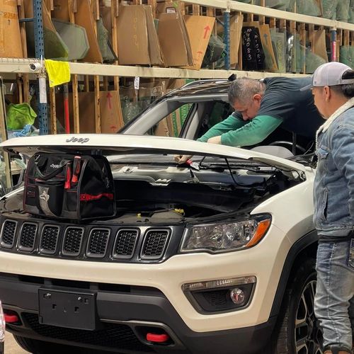 jeep compass with windshield out and ready to get a new glass installed