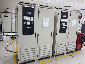 Industrial electrical control panels in a clean facility with meters and labels.