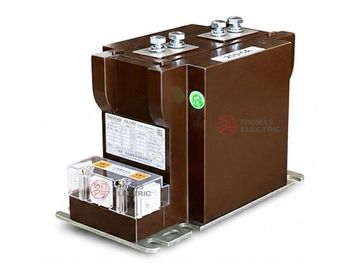 Brown electrical transformer with metal base and terminals.