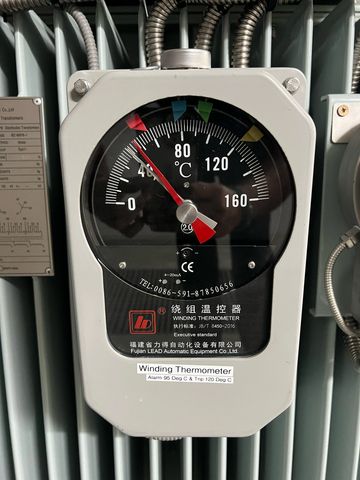 Close-up of a winding thermometer showing temperature near 50°C.