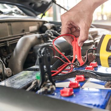 Testing a car battery using a digital device
- Photo attribution to Vecteezy
