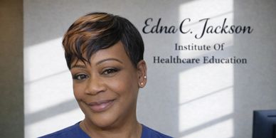 Smiling woman in front of a healthcare education institute sign.