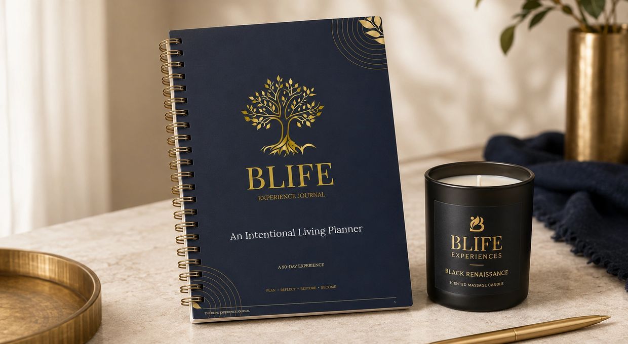 BLIFE Experience Journal and scented candle on a table.