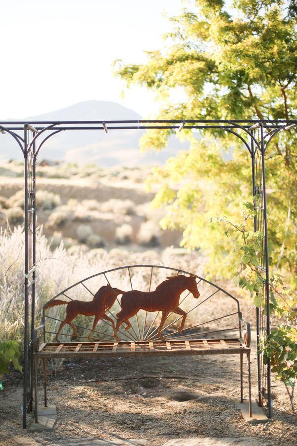 beautiful piece of rustic metal bench that sold at the estate sale