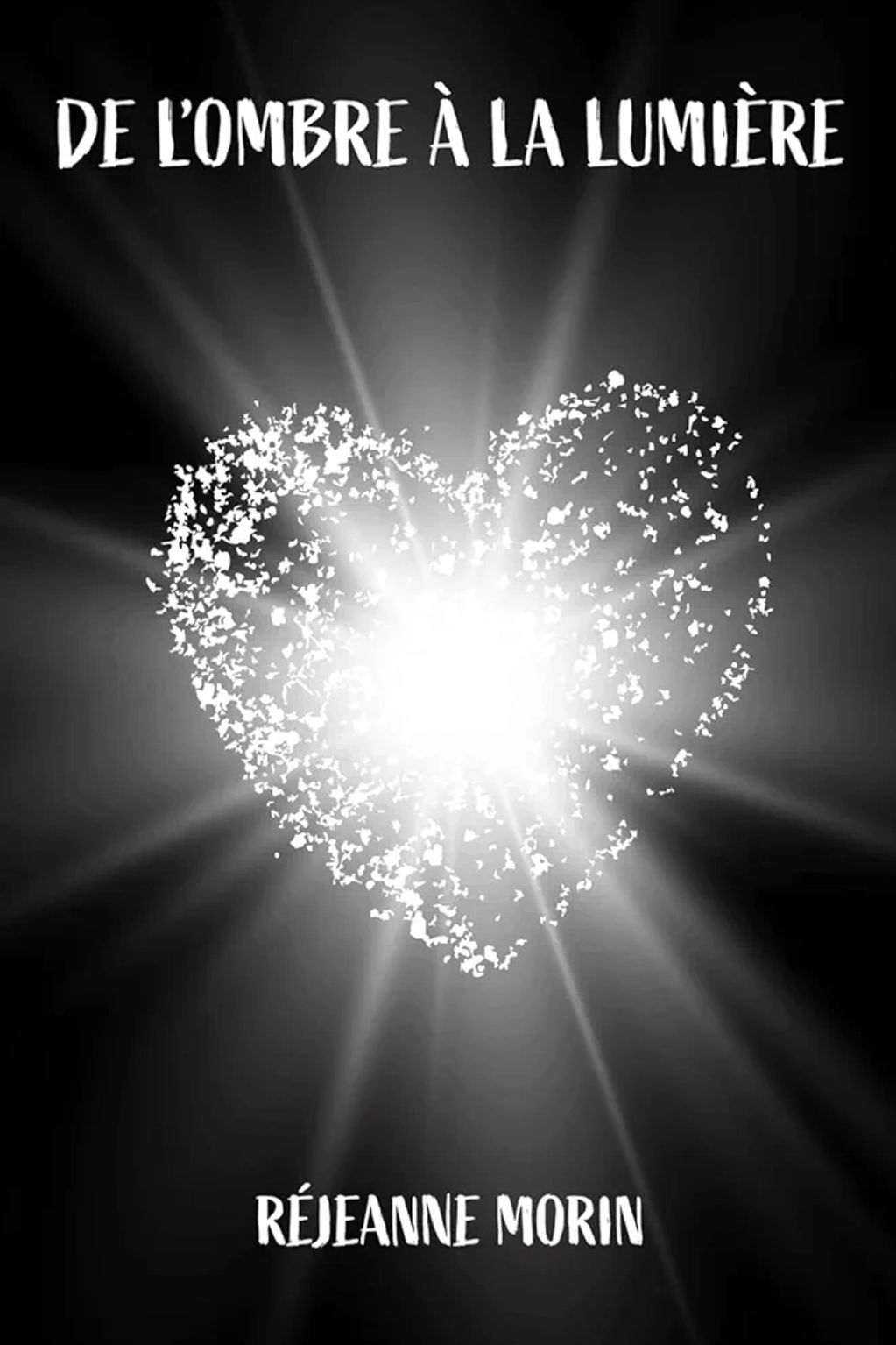 Livre noir avec coeur et rayons blancs, titre De l'ombre à la lumière et auteure Réjeanne Morin