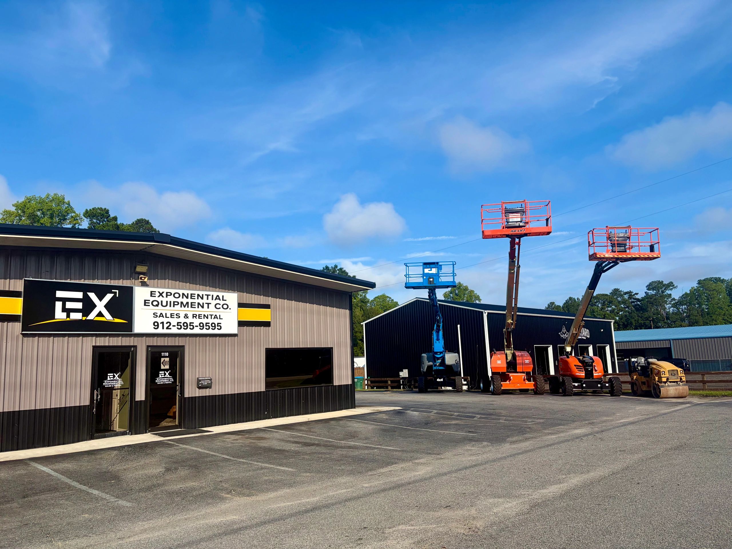 Exponential Equipment Co. Building with rental lifts.