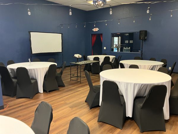 A digital projector screen for a presentation at Chelsea Party Loft in Chelsea, Michigan.