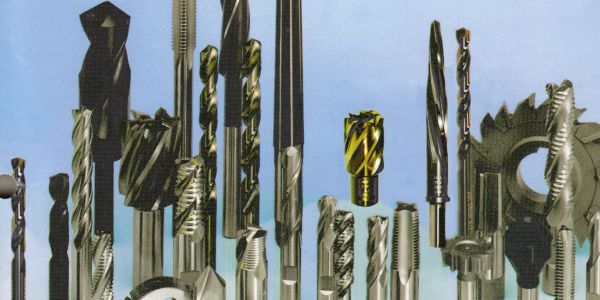 Variety of metal cutting tools arranged vertically.