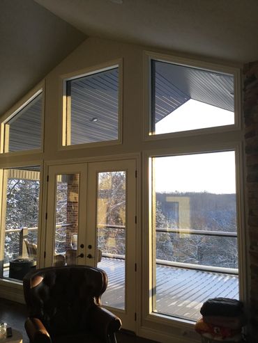 Custom insulated windows and glass handrails