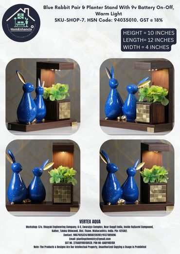 Wooden LED planter with Blue Rabbit Pair and a cube planter with artificial plants.