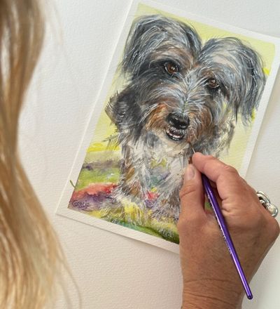 Teejay painting Gracie portrait