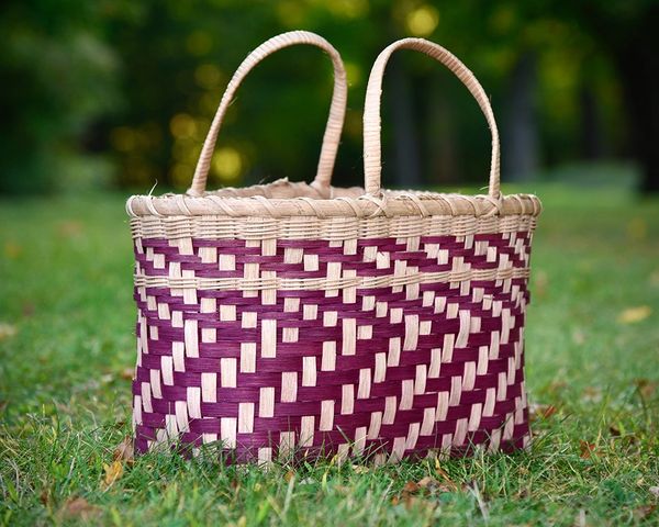 A woven basket as a symbol of gathering together.