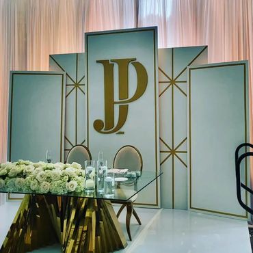 event planner : a good event planner
backdrops built by Ox 
table rental: Black tie