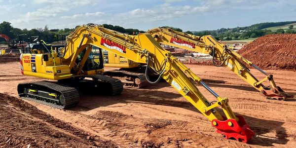 Our newest excavator alongside one of our older machines — both maintained to the same high standard. The pride our operators take in the machines is the same pride they put into every job they carry out.