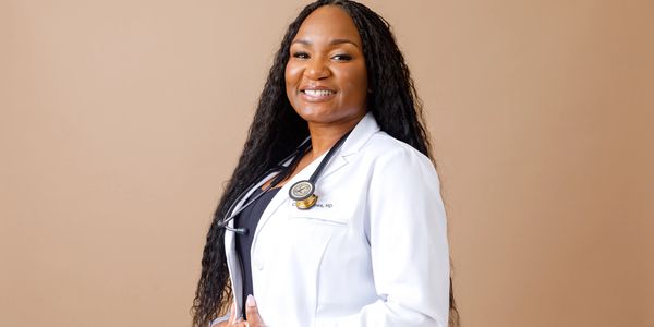 Dr. Charis James