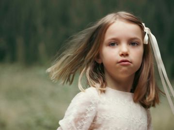 blonde child turning, family photography