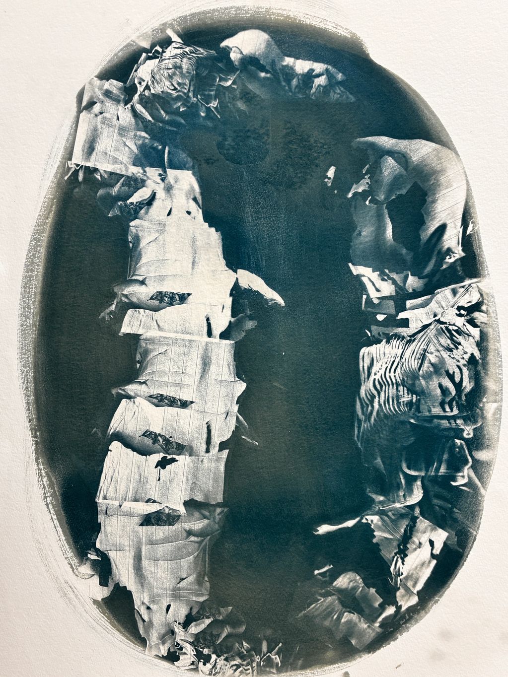 cyanotype on watercolour paper, of a collage disfigured body curated into abstract shapes