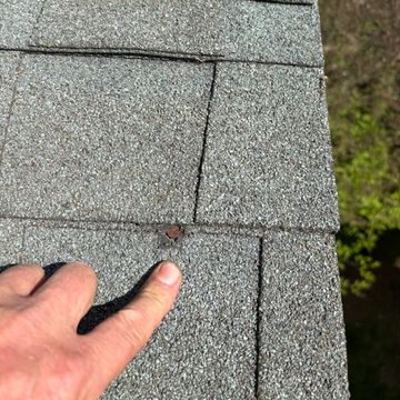 Roof inspection in Urbana, MD. Misplaced roof nail