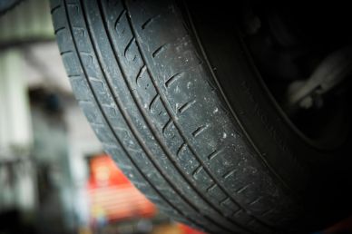 Close-up of a worn-out car tire.