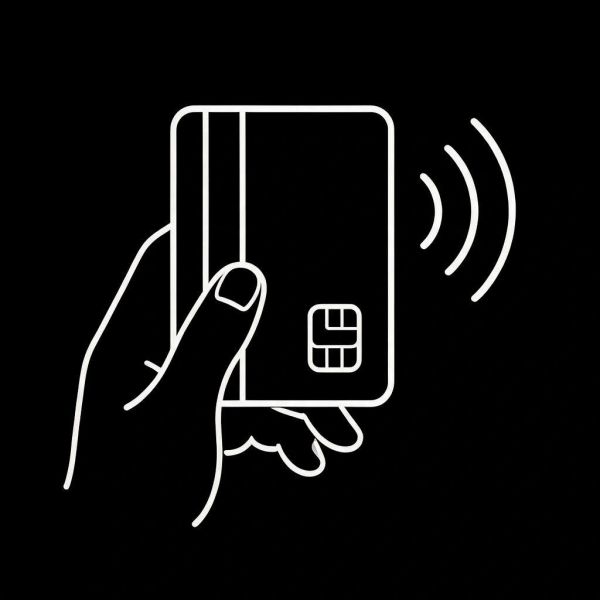 Hand holding a contactless payment card.