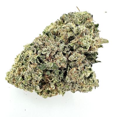 Close-up of a dense cannabis bud with trichomes and orange hairs.
