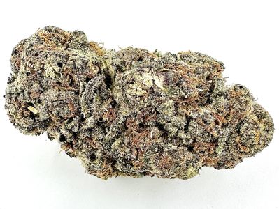 Close-up of a dense cannabis bud with trichomes.