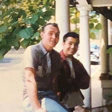 Roger Stuller on porch with friend in Huntingdon, Pennsylvania