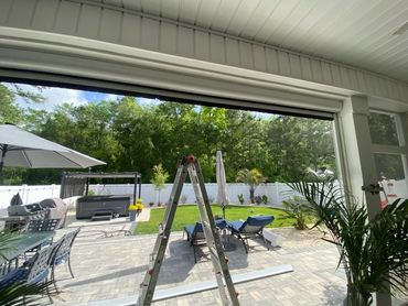 Porch/patio retractable screens
Garage door screen 
Coastal garage door screens