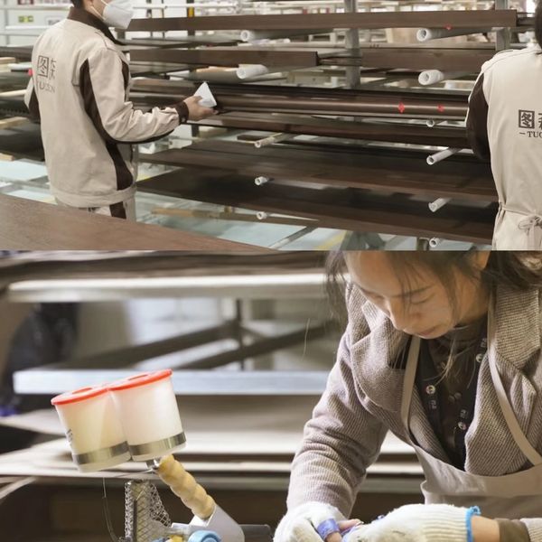 Workers handling materials and crafting items in a workshop environment.