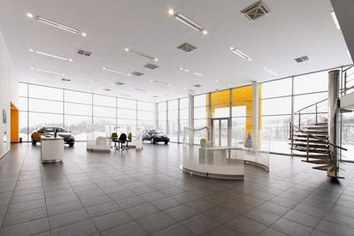Large office space with shiny, clean floors and windows.