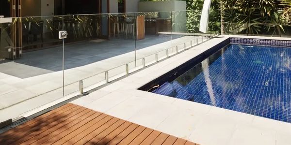Safety glass pool fencing and decorative fittings