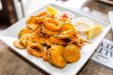 A Plate With Fried Onion Wings