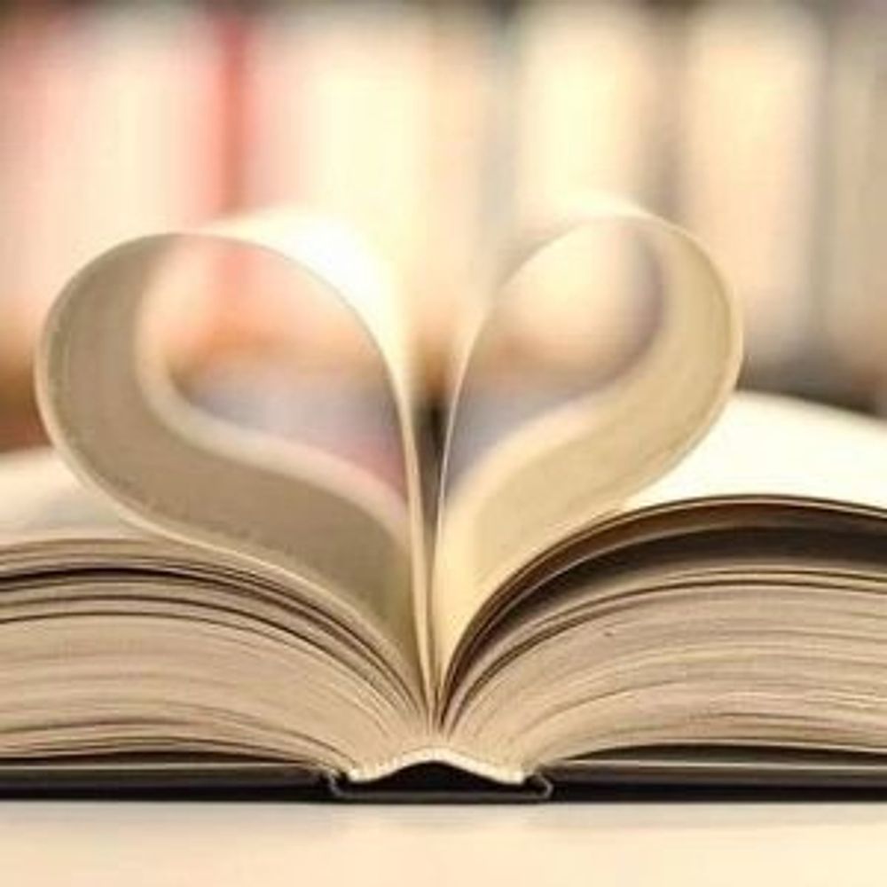 Book pages folded in heart shape