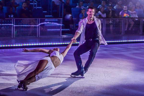 JD & Alexis Rappold performing Death Spiral ice skating trick on Harmony of the Seas. Royal Caribbea
