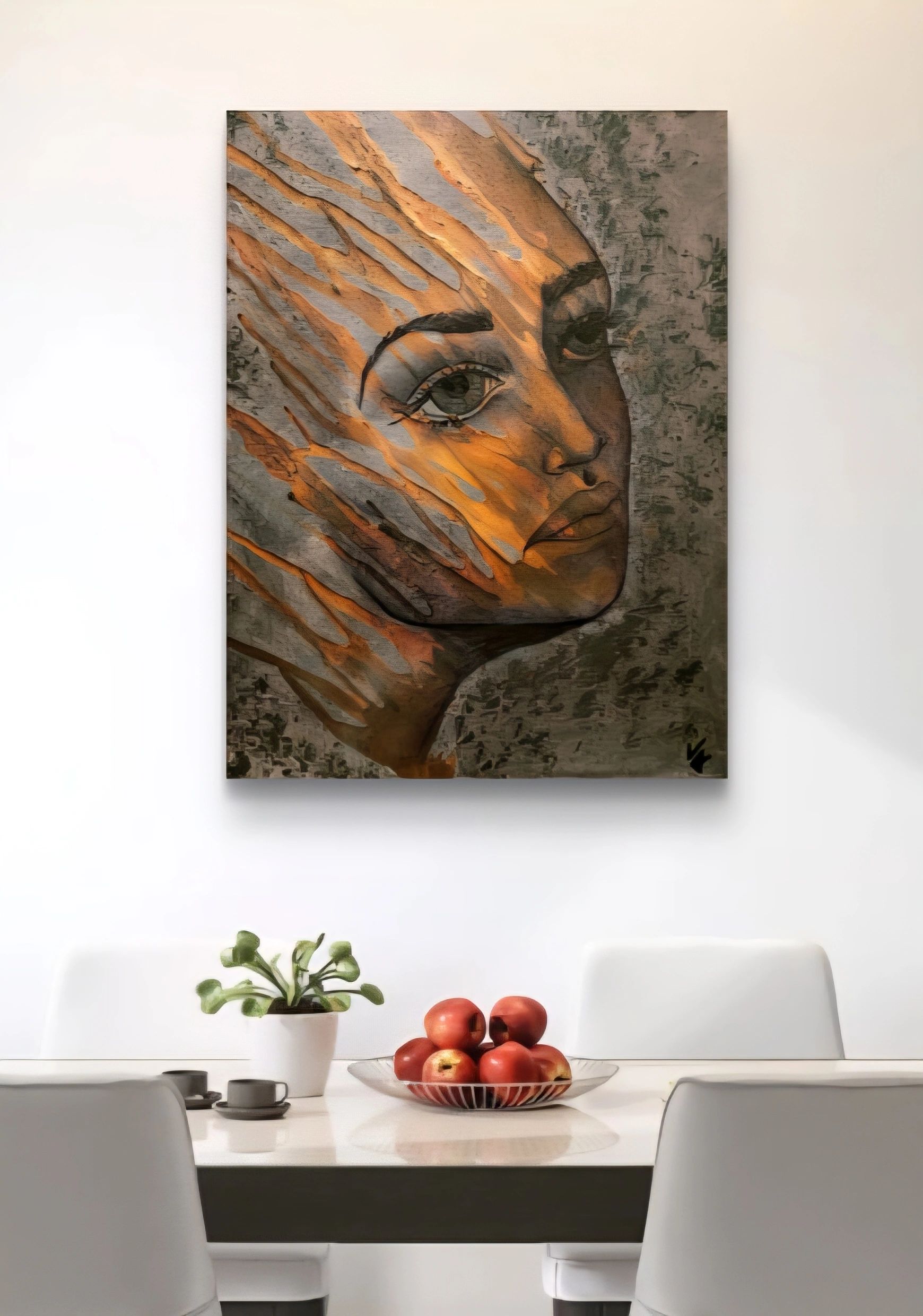 Abstract portrait painting hangs above a modern dining table with fruits and a plant.